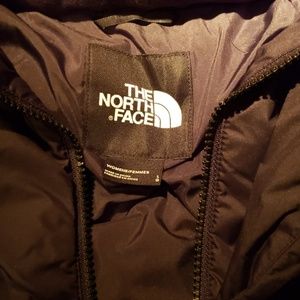 Brand new black North Face coat.  Size L